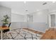 Second floor loft area with desk and accent rug with open view to other areas at 15315 Golden Beam Pl, Bradenton, FL 34211