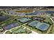 Aerial of tennis courts, a basketball court, and a lake offering diverse recreational options at 15607 White Linen Dr, Bradenton, FL 34211
