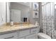 This bathroom has granite countertops, a sink, and a shower/tub combo at 15607 White Linen Dr, Bradenton, FL 34211