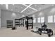 Fully equipped gym with strength training machines, free weights, and fitness accessories at 15607 White Linen Dr, Bradenton, FL 34211