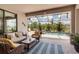 Relax on the lanai with ample seating overlooking the pool and backyard at 15607 White Linen Dr, Bradenton, FL 34211