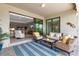Covered lanai with seating, views to interiors, and an outdoor feel at 15607 White Linen Dr, Bradenton, FL 34211