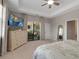 Spacious main bedroom features access to a private patio area and ample natural light at 15607 White Linen Dr, Bradenton, FL 34211