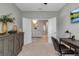 Office featuring neutral colors, a modern desk, and an elegant entryway with double doors at 15607 White Linen Dr, Bradenton, FL 34211