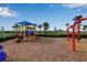 Colorful playground with slides, swings, and climbing structures in a well-maintained outdoor area at 15607 White Linen Dr, Bradenton, FL 34211
