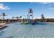 Vibrant splash pad offering a safe and fun water play area for children at 15607 White Linen Dr, Bradenton, FL 34211