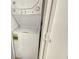 Conveniently located laundry closet featuring a stacked washer and dryer at 2055 Gulf Of Mexico Dr # G2-108, Longboat Key, FL 34228