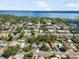 Beautiful aerial view showcases a neighborhood near a tranquil bay and lush greenery at 2330 7Th W Ave, Bradenton, FL 34205