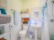 Quaint bathroom featuring classic fixtures, a pedestal sink, and a shower/tub combo at 2330 7Th W Ave, Bradenton, FL 34205