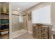 Elegant shower with glass door, shelving and a large window with natural light at 2332 Mizner Bay Ave, Bradenton, FL 34208