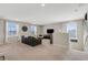 Upstairs bonus room featuring cozy sitting area with large windows and natural light at 2332 Mizner Bay Ave, Bradenton, FL 34208