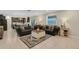 Spacious living room featuring comfortable seating and an open layout at 2332 Mizner Bay Ave, Bradenton, FL 34208