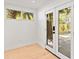 Bright room with light wood floors and view of the backyard at 2410 Floyd St, Sarasota, FL 34239