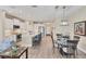 Beautiful kitchen with stainless appliances, quartz countertops, and a breakfast bar at 2631 Sapphire Blue Ln, Bradenton, FL 34211