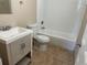 Bathroom featuring a vanity and a shower-tub combo at 2650 Coconut Bay Ln # 521, Sarasota, FL 34237