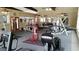 Bright fitness center with modern exercise equipment and a well-lit space for workouts at 2650 Coconut Bay Ln # 521, Sarasota, FL 34237