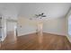 Spacious living room featuring sleek wood floors and a modern ceiling fan at 2953 Oak St, Sarasota, FL 34237