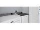 Laundry area with a modern washer and dryer appliances at 3429 97Th E Ln, Palmetto, FL 34221