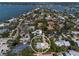 Beautiful aerial view of a waterfront neighborhood, highlighting lush landscaping and water access at 3446 Anglin Dr, Sarasota, FL 34242