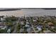 Aerial view of neighborhood homes and bay waters, showcasing community and convenient access to the water at 3446 Anglin Dr, Sarasota, FL 34242