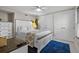 Cozy bedroom featuring a comfortable bed, dresser, and ample closet space at 3446 Anglin Dr, Sarasota, FL 34242