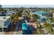 Aerial view of the commercial district featuring colorful storefronts, palm trees and street traffic at 3446 Anglin Dr, Sarasota, FL 34242