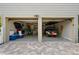 Spacious two-car garage offering ample storage space for vehicles, bikes, and recreational equipment at 3446 Anglin Dr, Sarasota, FL 34242