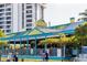 Bright and inviting restaurant exterior with outdoor seating and a vibrant atmosphere on the street at 3446 Anglin Dr, Sarasota, FL 34242