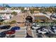 Lively restaurant exterior with a thatched roof, outdoor seating, and vibrant street scene at 3446 Anglin Dr, Sarasota, FL 34242