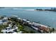 Beautiful waterfront homes with docks and lush landscaping along the serene bay at 3446 Anglin Dr, Sarasota, FL 34242