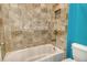Bathroom featuring a tiled shower with a built-in niche at 364 Grande Vista Blvd, Bradenton, FL 34212