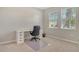 Bedroom featuring natural light, carpet, and a white desk at 364 Grande Vista Blvd, Bradenton, FL 34212