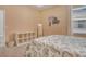 Relaxing bedroom offering a comfortable queen bed, with a window at 364 Grande Vista Blvd, Bradenton, FL 34212