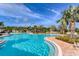 Large community pool featuring a shallow entrance and spacious sundeck, creating an ideal setting for recreation and relaxation at 364 Grande Vista Blvd, Bradenton, FL 34212
