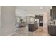 Open-concept living area with seamless transition from the living room, dining area, and kitchen at 364 Grande Vista Blvd, Bradenton, FL 34212