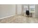 Bright office space filled with natural light, a desk, and tiled floors at 364 Grande Vista Blvd, Bradenton, FL 34212