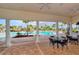 Inviting pool area featuring ample seating and shade for relaxation by the refreshing pool at 364 Grande Vista Blvd, Bradenton, FL 34212