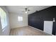 Bright bedroom with new floors, built-in storage and modern design at 3730 Ferguson St, Sarasota, FL 34233