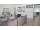 Spacious living room featuring modern décor, a display cabinet, and an open floor plan at 3730 Ferguson St, Sarasota, FL 34233