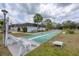 Shuffleboard court with benches and palm trees enhancing the community's recreational amenities at 3816 Blue Stone Way # 97, Sarasota, FL 34232