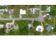 Aerial view of homes in a residential area surrounded by green trees at 4015 Asbury Pl, Sarasota, FL 34233