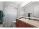 Bathroom featuring a shower/tub combo and single sink vanity at 4251 Austin St, Sarasota, FL 34233