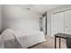 Spare bedroom featuring a twin bed, closet, and neutral walls at 4251 Austin St, Sarasota, FL 34233