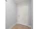 Entryway featuring a white door and tile floors at 4251 Austin St, Sarasota, FL 34233