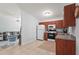 Cozy kitchen area offering an open layout to the adjacent living area and dining space at 4251 Austin St, Sarasota, FL 34233