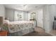 Bright carpeted main bedroom featuring a queen bed and two closets at 4251 Austin St, Sarasota, FL 34233