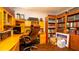 Well-lit office space with hardwood floors and wooden shelves for storage at 4310 7Th W Ave, Bradenton, FL 34209