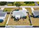 Aerial view showcasing the layout of a fenced-in backyard, plus the surrounding neighborhood at 4375 Tortoise Rd, Venice, FL 34293