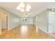 Open-plan living room with tiled floor and modern ceiling fan at 4375 Tortoise Rd, Venice, FL 34293