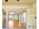 View from office with sliding glass doors to the open-plan living room at 4375 Tortoise Rd, Venice, FL 34293